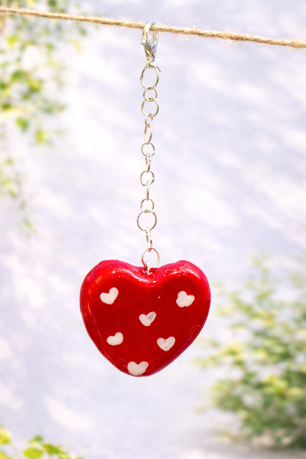Handmade red puffy heart clay keychain designed as a romantic bag charm and Valentine's Day gift