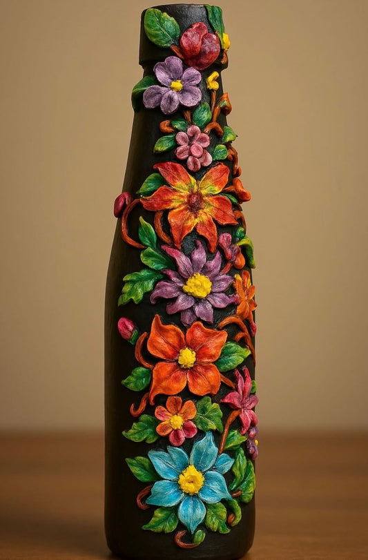 Handmade black square bottle vase decorated with intricate 3D clay flowers, designed as statement floral home decor