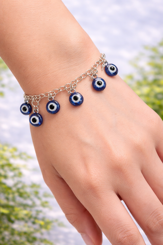 Handmade blue evil eye charm bracelet designed as a stylish nazar protection accessory and meaningful everyday jewelry