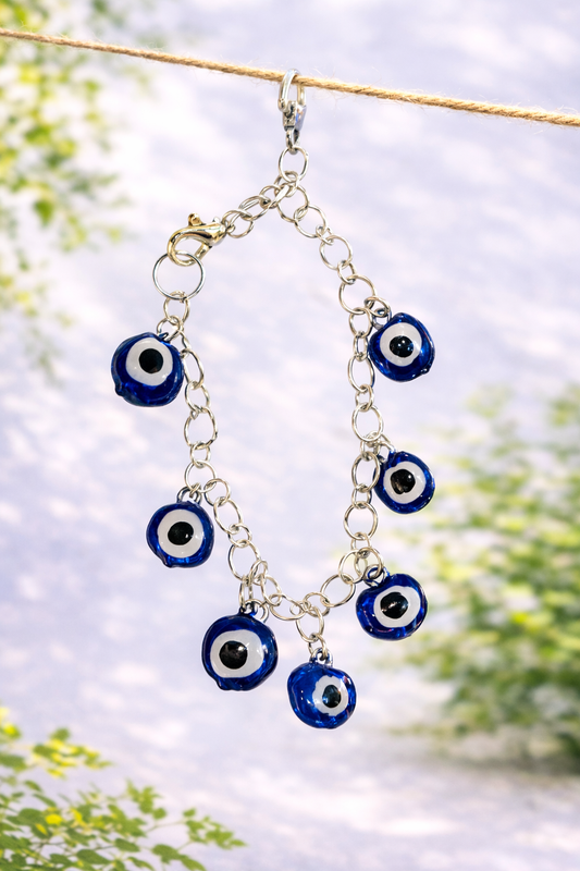Handmade blue evil eye charm bracelet designed as a stylish nazar protection accessory and meaningful everyday jewelry