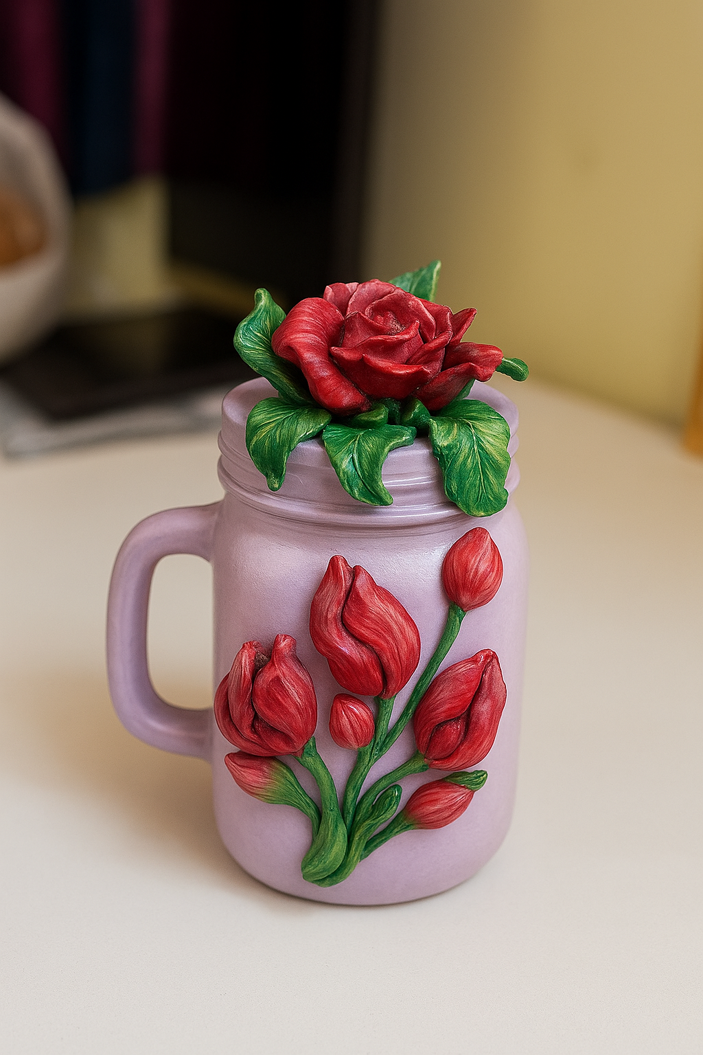 Handmade mason jar vase decorated with rose and tulip clay flowers, styled as elegant floral home decor