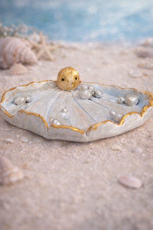 Handmade oyster shell trinket dish with pearl detail, designed as a ring holder and coastal-inspired jewelry tray